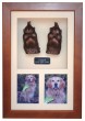 Dog paw casts framed with photos